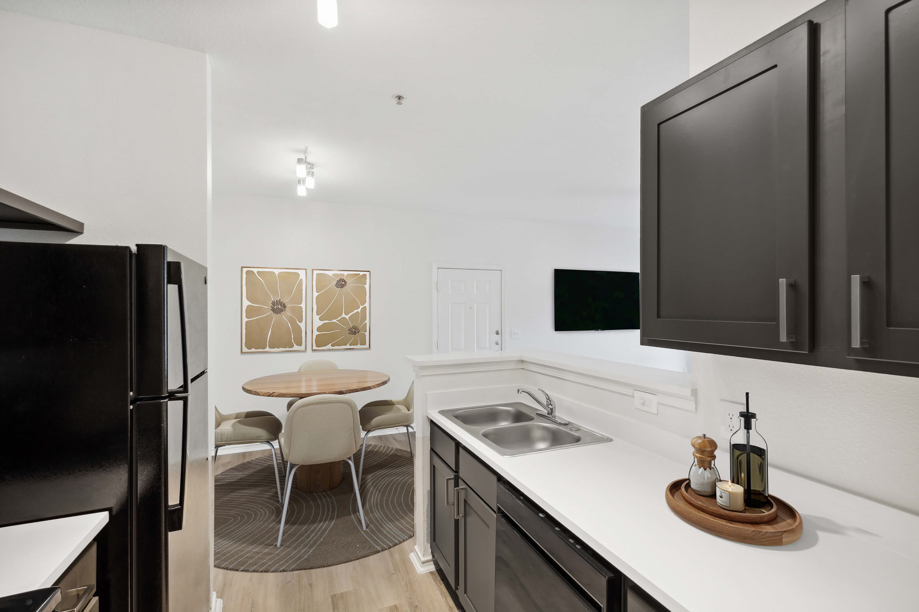 Kitchen and dining area at Bonito Parque Apartments in San Antonio TX
